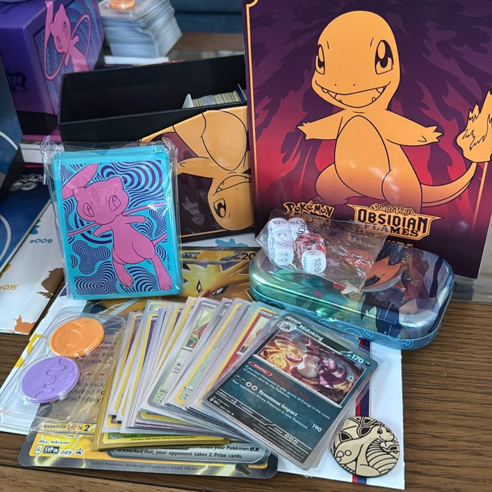 Pokémon TCG Lot #7 - Includes 200+ Pokemon Cards, 65 Sleeves, Tin, Box, Poster +